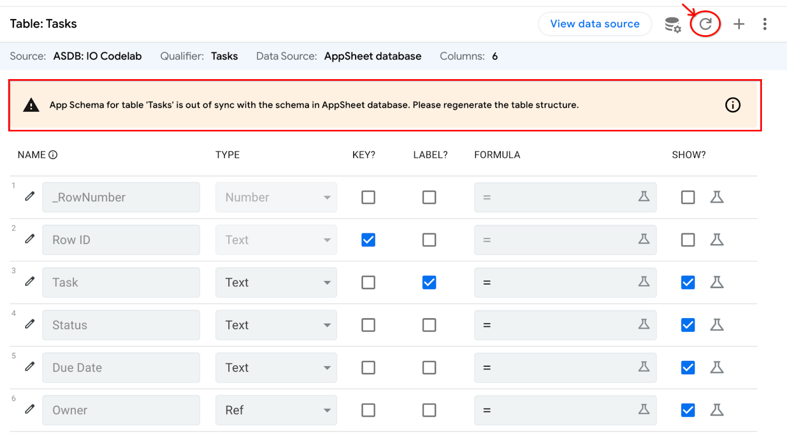 Editor de AppSheet en el que se muestra la detección de una modificación del esquema de la base de datos y se muestra una advertencia