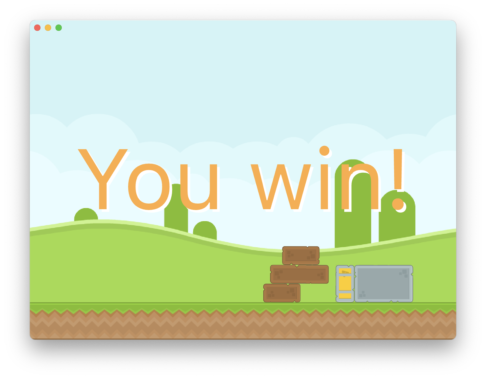 Uma janela do app com colinas verdes ao fundo, camada de solo, blocos no chão e uma sobreposição de texto com a frase &quot;You win!&quot;.