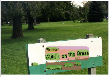 مثال تشخیص متن Image of sign on grass demonstrating text recognition API